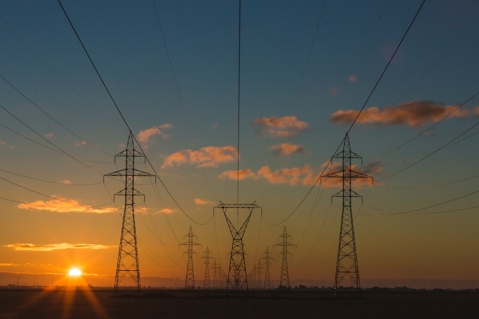 Power transmission lines at sunset