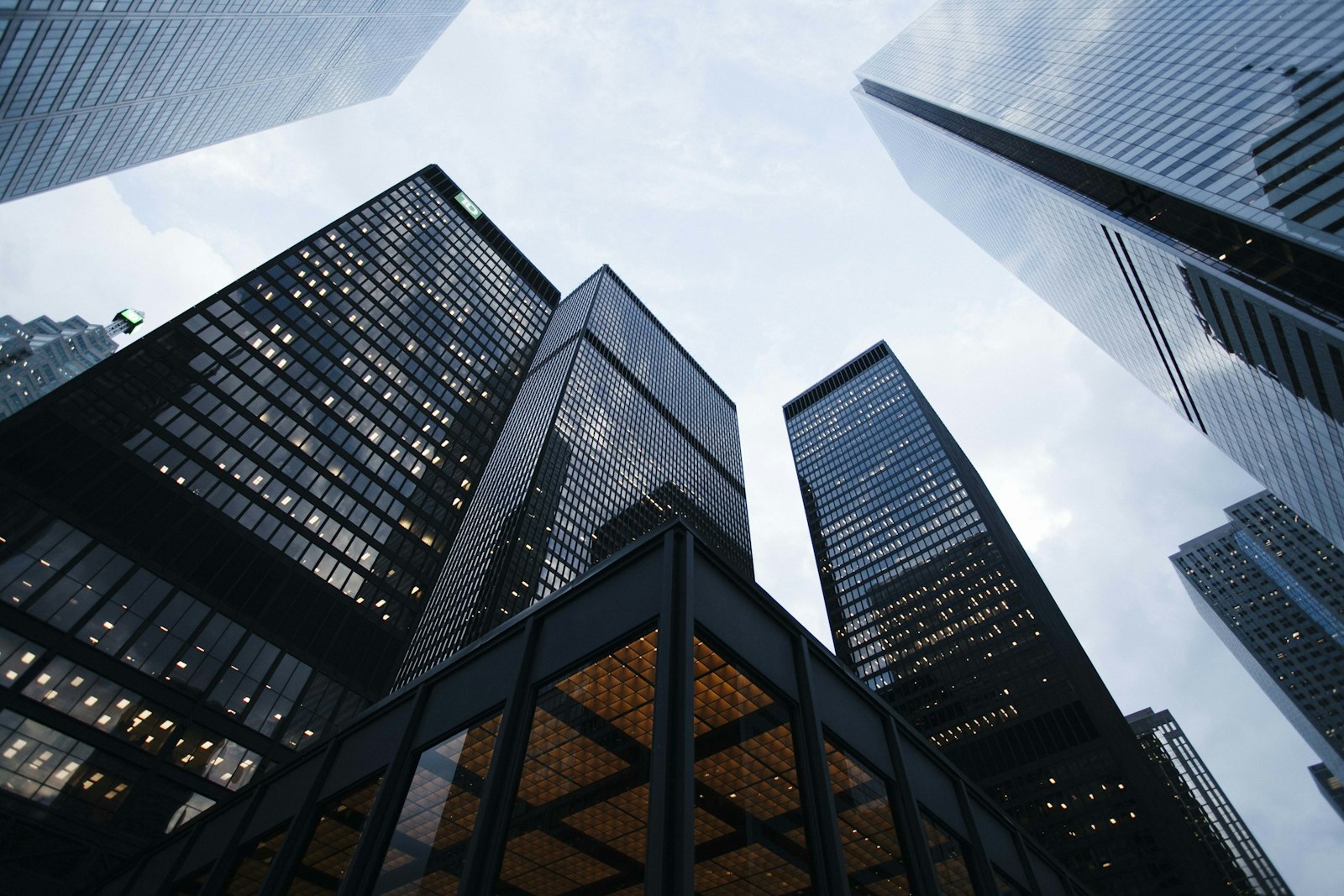 Looking up at glass skyscrapers